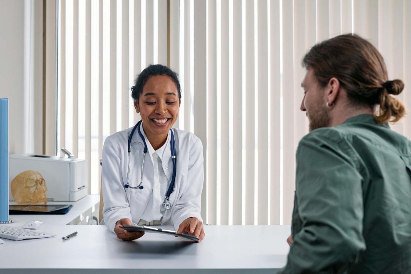 Physician consulting a patient